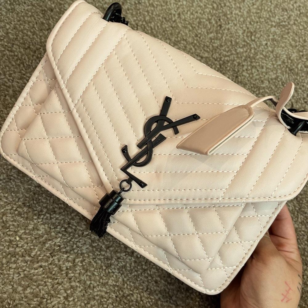 Fake Yves Saint Laurent body bag costume prop